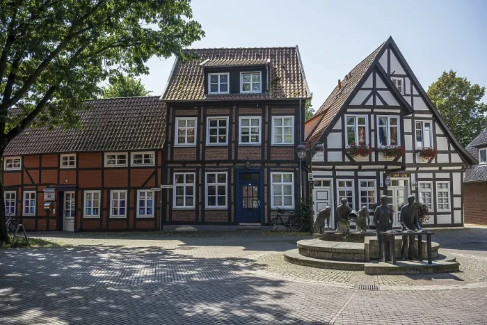 Framed Print : Row of traditional half-timbered houses along a quiet