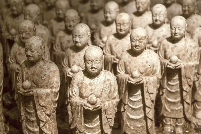 Framed Print : Rows of similar Japanese Jizo sculptures
