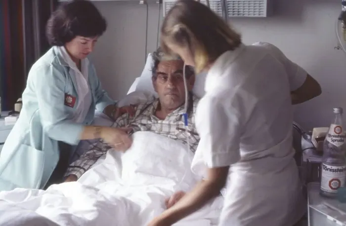 Framed Print : Ruhr. Hospital. Nurse with patient ca. 1982-4