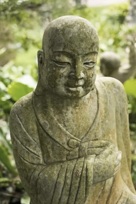 Framed Print : Ruined stone statue Ksitigarbha Bodhisattva in garden