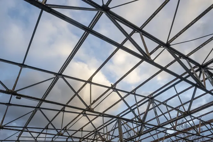 Framed Print : Rusted roof truss of an old industrial building