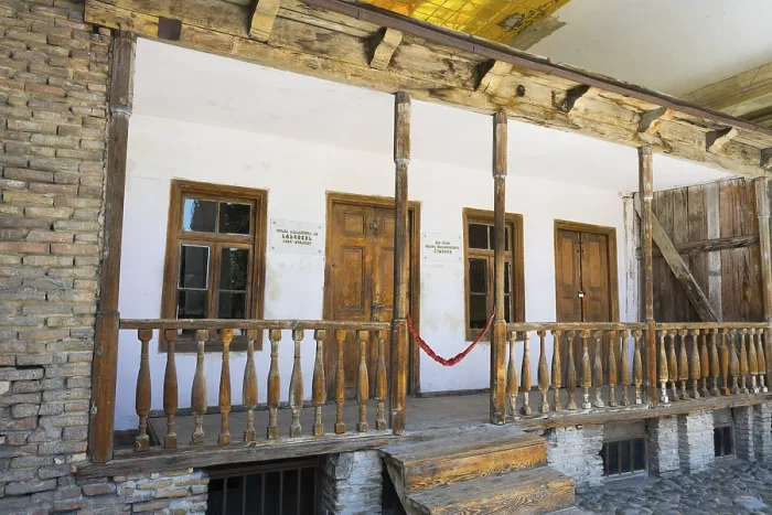 Framed Print : Rustic wooden veranda of a building with old wooden windows Framed Print : Rustic wooden veranda of a building with old wooden windows