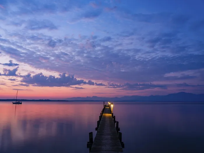Framed Print : Sailing boat and jetty on Lake Chiemsee at dawn