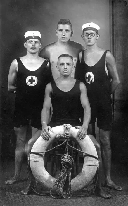 Framed Print : Four sailors, two of them Red Cross paramedics