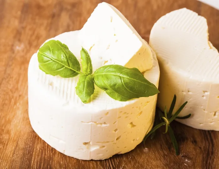 Framed Print : Salted soft cheese with basil leaf on the board Framed Print : Salted soft cheese with basil leaf on the board