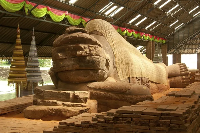 Framed Print : The sandstone reclining Buddha housed at Wat Dharmacakra Semaram is the oldest reclining Buddha in Thailand