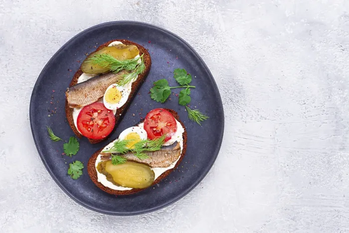 Framed Print : Sandwiches on rye bread with sprats