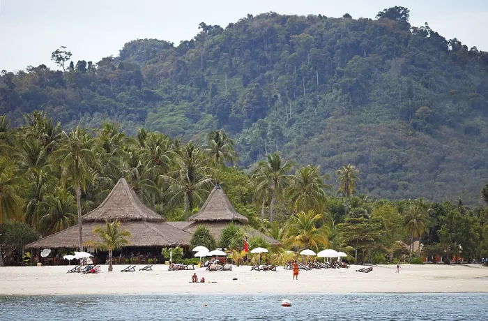 Framed Print : Sandy beach beach and straw huts at Sivalai Resort