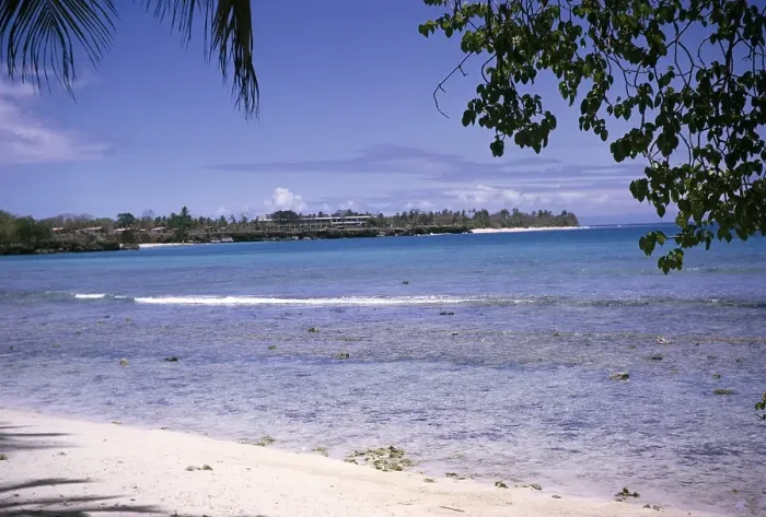 Framed Print : Sandy beach tropical sea with hotel on headland, island of Tobago, 1963 Framed Print : Sandy beach tropical sea with hotel on headland, island of Tobago, 1963