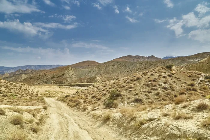 Framed Print : A sandy road in the mountains of Asia