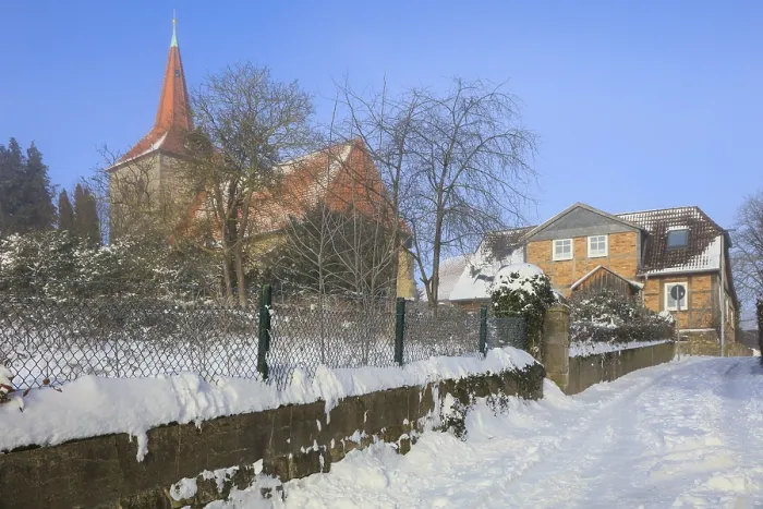 Framed Print : Sankt Marien church and half-timbered house