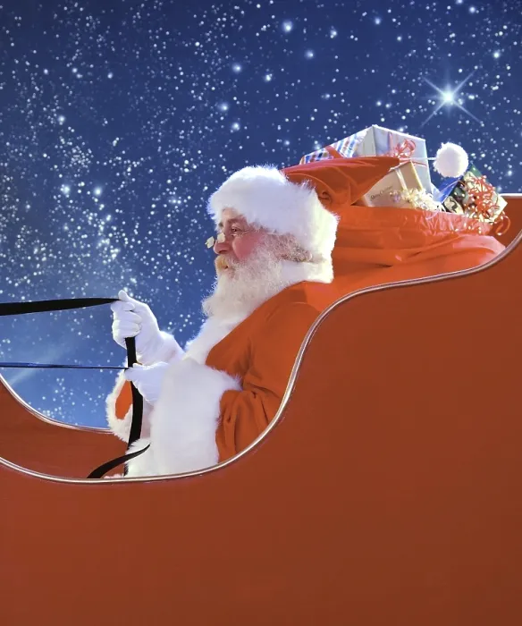 Framed Print : Santa Claus in a sleigh filled with presents soaring through a starry night sky
