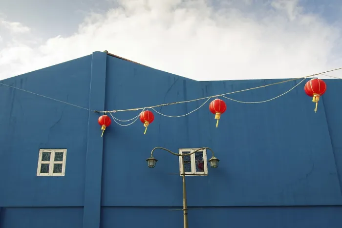 Framed Print : Scenic Chinatown architecture with bright blue building wall and red lanterns line from Singapore