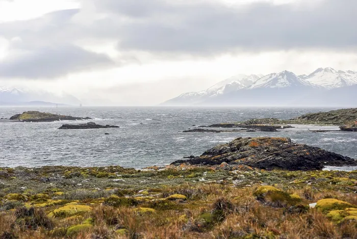 Framed Print : Scenic view of the Beagle Channel with rocky islands and snow-capped mountains Framed Print : Scenic view of the Beagle Channel with rocky islands and snow-capped mountains