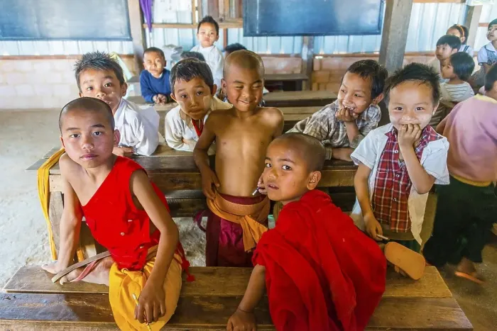 Framed Print : School children sitting at their desks