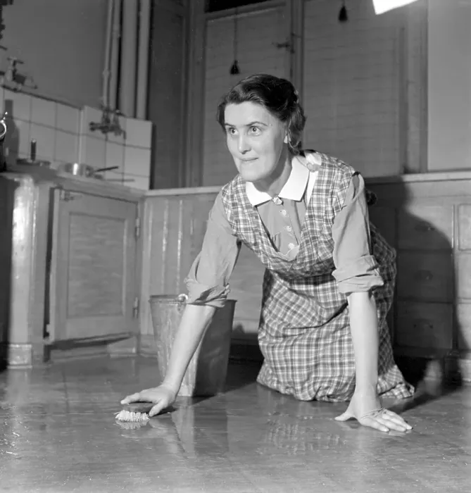 Framed Print : Scrubbing the floor in the 1940s
