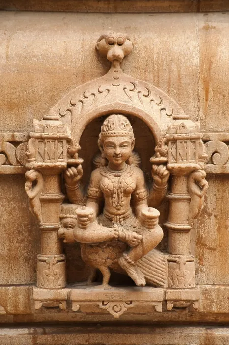 Framed Print : Sculpture of goddess chakreshwari sitting on a eagle on the wall of panchasara parasvanath jain temple