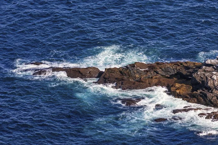 Framed Print : Sea waves rolling in against the rocks on a rocky coast Framed Print : Sea waves rolling in against the rocks on a rocky coast