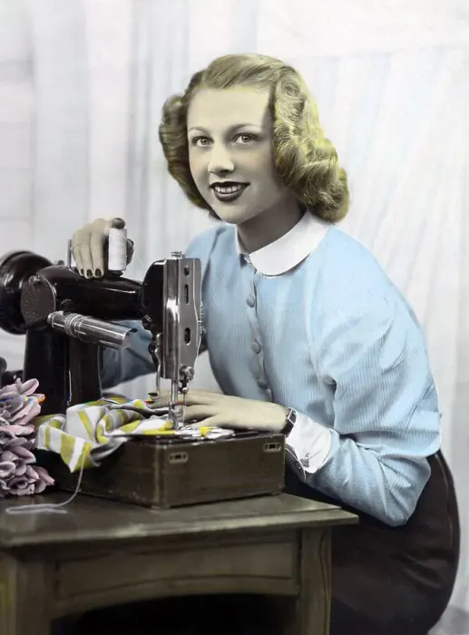 Framed Print : Seamstress, woman at sewing machine Framed Print : Seamstress, woman at sewing machine