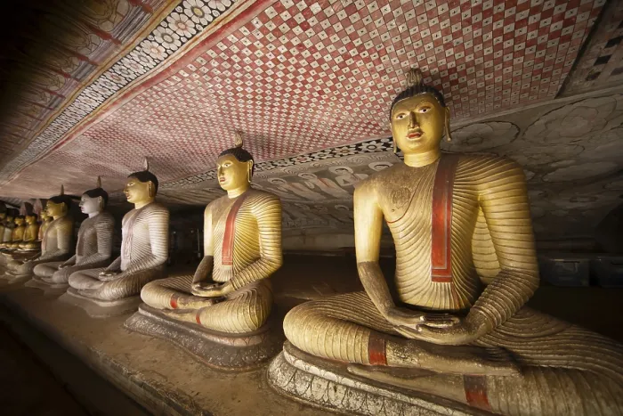 Framed Print : Seated Buddha statues in the Dambulla cave temple