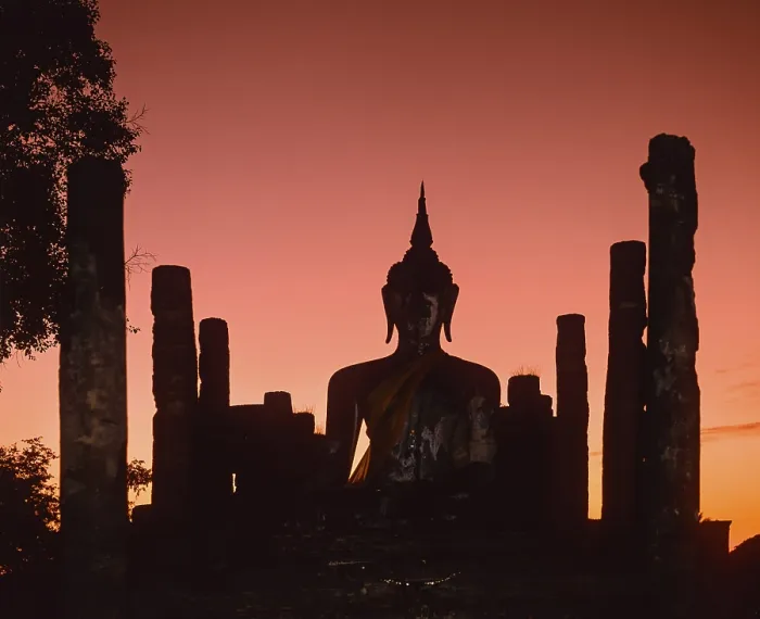 Framed Print : Seated Buddha at Wat Mahathat, silhouette at dusk Framed Print : Seated Buddha at Wat Mahathat, silhouette at dusk