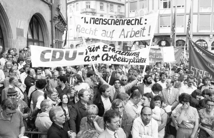 Framed Print : To secure their jobs, 6000 metalworkers of the Adler-Triumpf company took to the streets in protest in September 1981