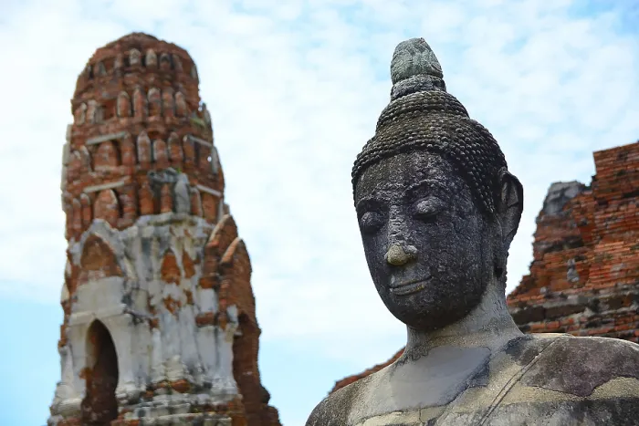 Framed Print : Serene buddha statue stands tall amidst ancient temple ruins
