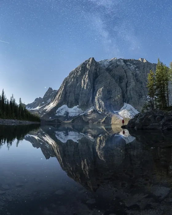 Framed Print : A serene mountain landscape with calm lake reflections under a starry night sky