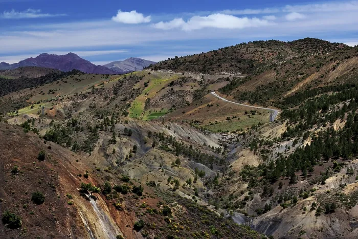 Framed Print : Serpentine road through the mountainous landscape of the High Atlas Mountains Framed Print : Serpentine road through the mountainous landscape of the High Atlas Mountains