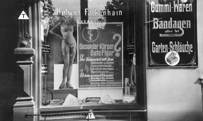 Framed Print : Shop window of a drugstore, underwear for a good figure