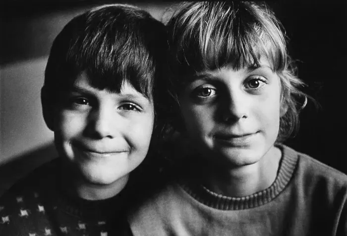 Framed Print : Siblings, boy and girl, about 13 and 11 years old