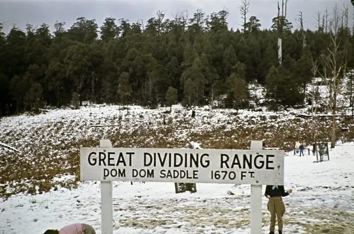 Framed Print : Sign for Dom Dom Saddle of the Great Dividing Range, Victoria, Australia 1956 Children playing in the snow