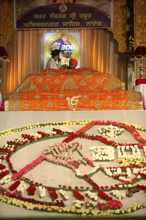 Framed Print : Sikh cleric waves holy Guru Granth Sahib celebration Consecration perpetual Guru Granth Sahib Nanded