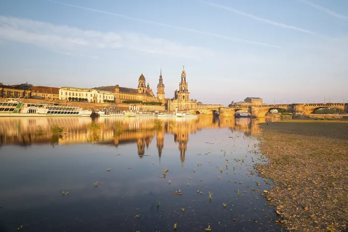 Framed Print : Silhouette of the Old Town with reflection in the Elbe in the morning