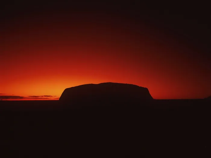 Framed Print : Silhouette outline of Ayers Rock or Uluru in red sunrise or sunset