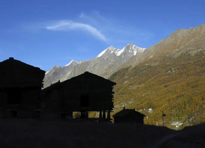 Framed Print : Silhouettes of traditional huts on pillars