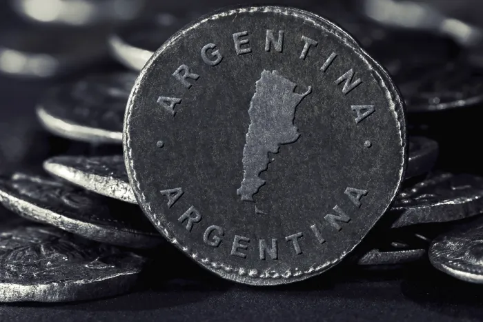 Framed Print : Silver Coin with Map of Argentina