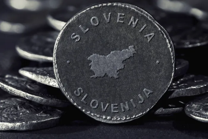 Framed Print : Silver Coin with Map of Slovenia Framed Print : Silver Coin with Map of Slovenia