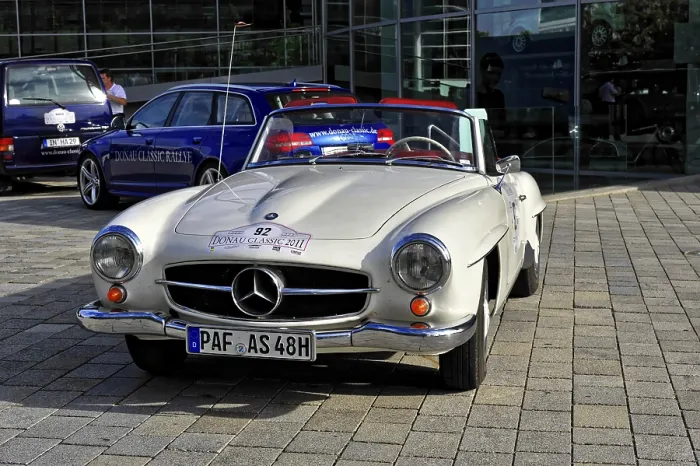 Framed Print : Silver Mercedes-Benz vintage convertible in sunlight on cobblestones