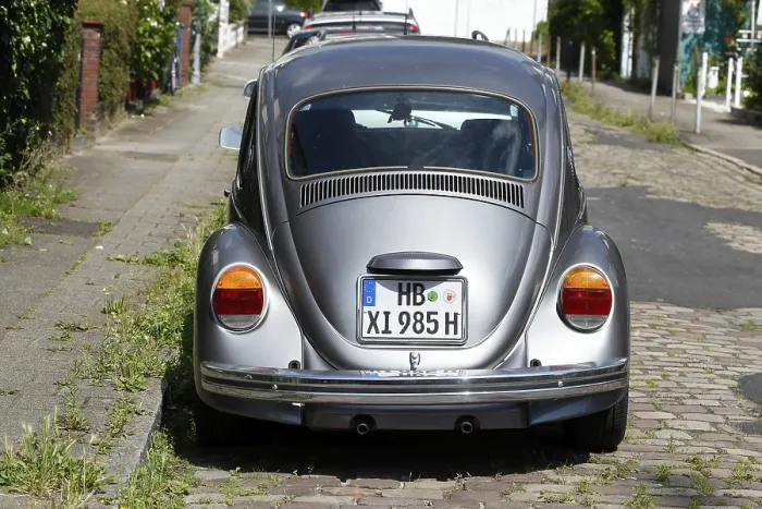 Framed Print : Silver VW Beetle parked on the street Framed Print : Silver VW Beetle parked on the street
