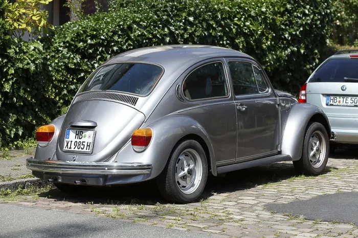 Framed Print : Silver VW Beetle parked on the street