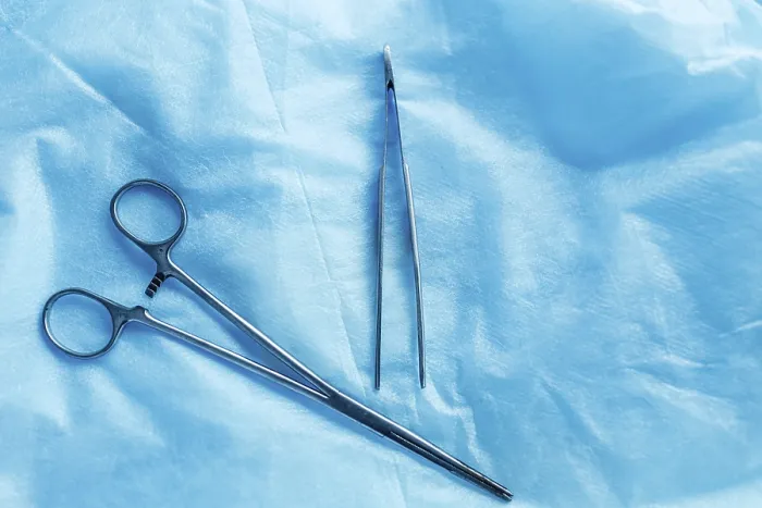 Framed Print : Simple arrangement of medical tools on a blue surface Framed Print : Simple arrangement of medical tools on a blue surface