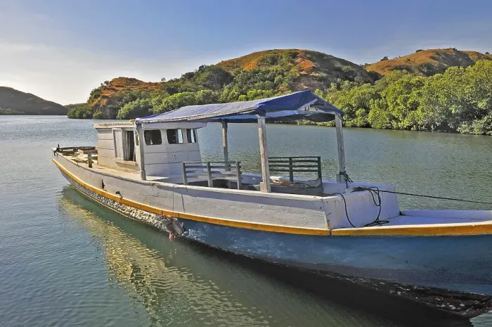 Framed Print : Simple typical wooden boat at the jetty, Rinca Island, Loh Buaya, Komodo National Park, Indonesia, Asia
