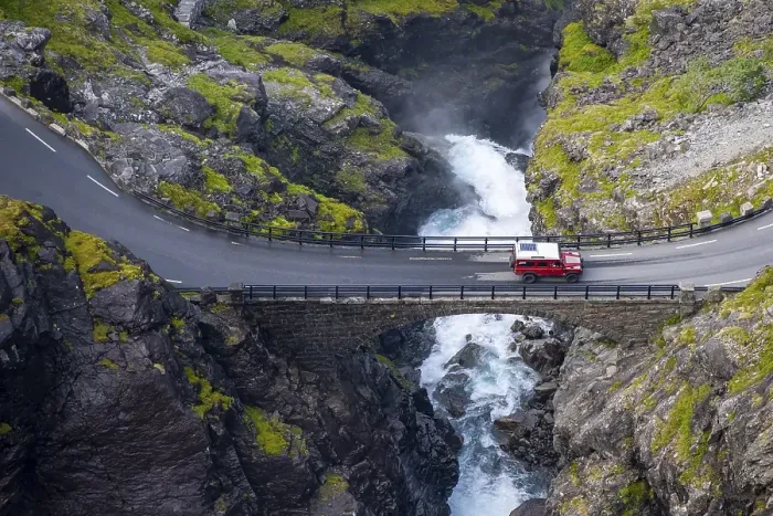 Framed Print : Single car on the mountain road Trollstigen