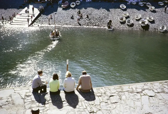 Framed Print : Sitting people at the harbour, Clovelly, North Devon, England, Great Britain September 1968