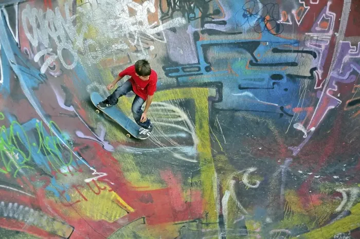 Framed Print : Skateboarder, 10 years, bowl of a skateboarding ramp Framed Print : Skateboarder, 10 years, bowl of a skateboarding ramp