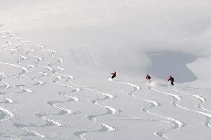 Framed Print : Ski hikers descending from the peak of Mount Joel Framed Print : Ski hikers descending from the peak of Mount Joel