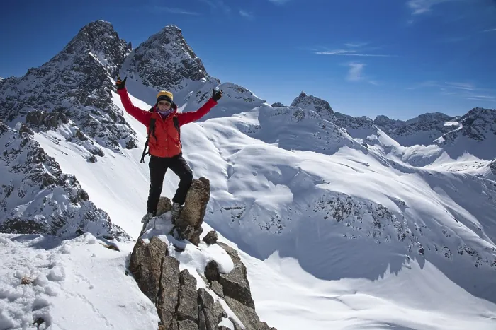 Framed Print : Ski tourer in victorious pose on the summit of the Landschaftsspitze