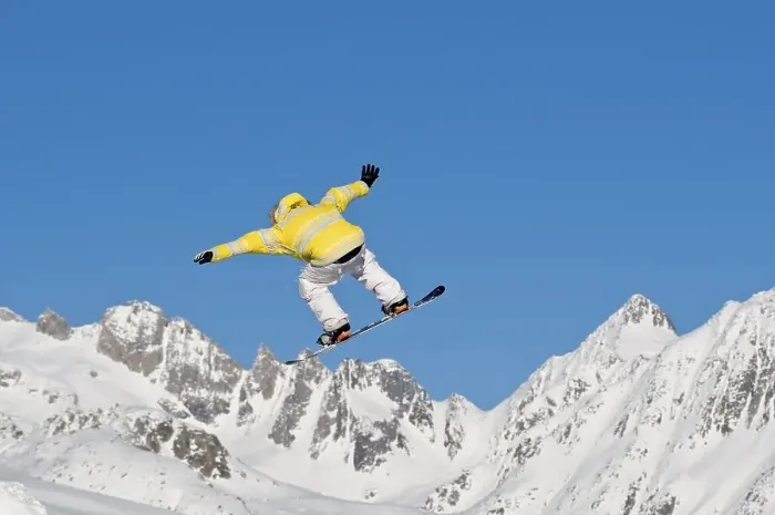 Framed Print : Skier jumping, against blue sky Framed Print : Skier jumping, against blue sky