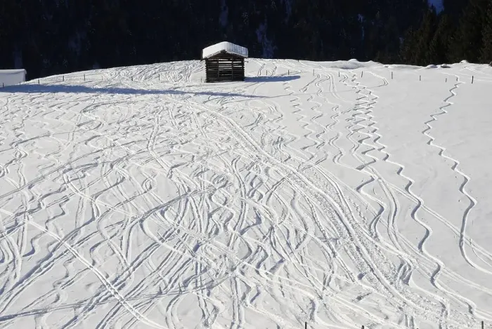 Framed Print : Skiing trails in deep powder snow